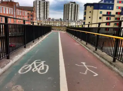 Why do cyclists ride on the pavement?