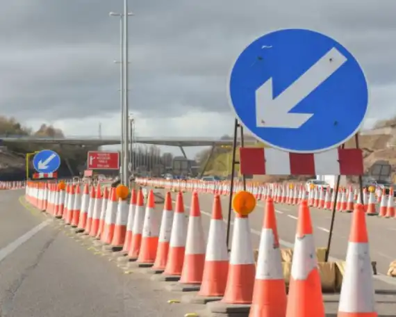 Huge Lorries Form Mobile Crash Barriers at Roadworks Image 0
