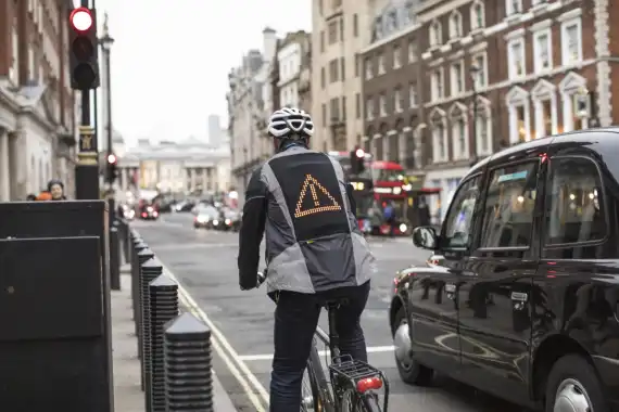 Drivers & Cyclists Communicate via Ford Emoji Jacket: Road Safety Image