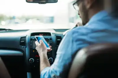 Drivers face tough, new, hand-held phone rules in 2022