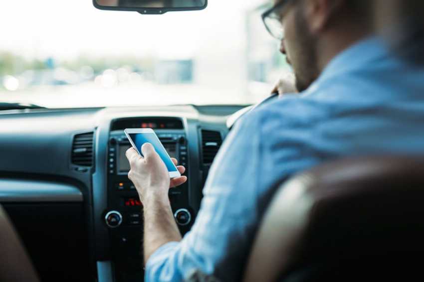 Drivers face tough, new, hand-held phone rules in 2022