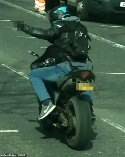 Biker who literally stuck his finger up to the system finally caught by police