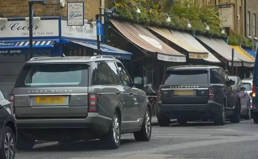 One rule for one? Khan’s entourage park on double-yellows