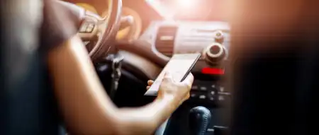 Debate: Should mobile phones be confiscated from drivers caught behind the wheel?