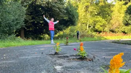 Landscape Gardener Goes Viral on TikTok for Planting Flowers in Potholes