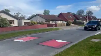 Drivers puzzled as council paints fake speed bumps in traffic-calming trial