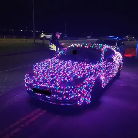 Festive Driver Pulled Over After Covering Car in Christmas Lights