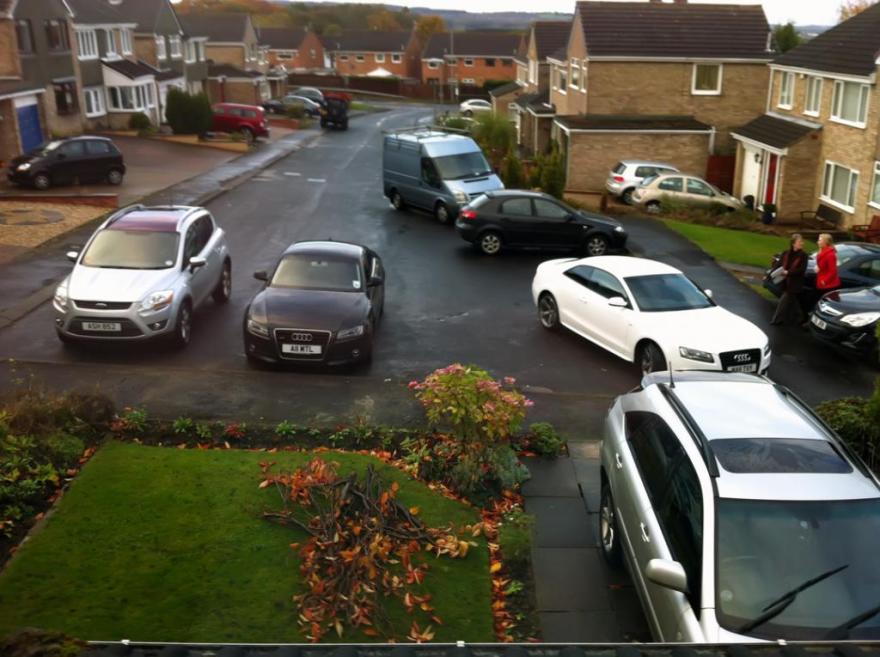 I own the road - parking outside a neighbours house