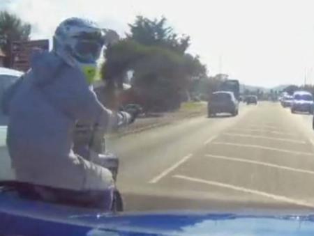 Road rage driver knocks motorcyclist off bike after 50mph chase down residential streets