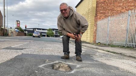 Motorist told to find 'exact pothole' that damaged car